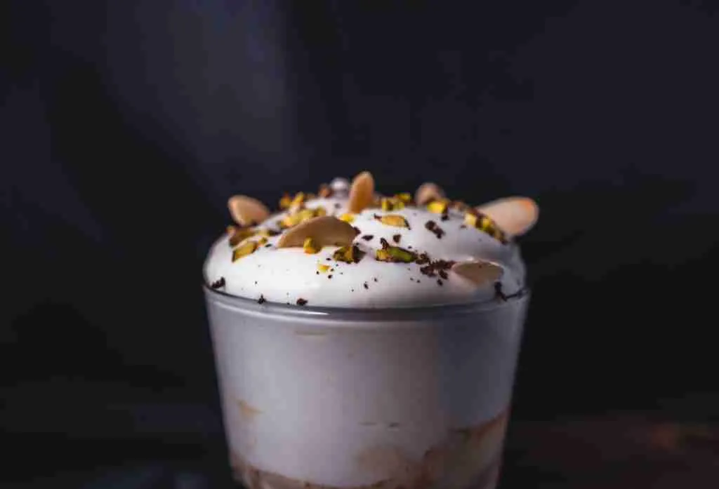 white cream with yellow and black sprinkles