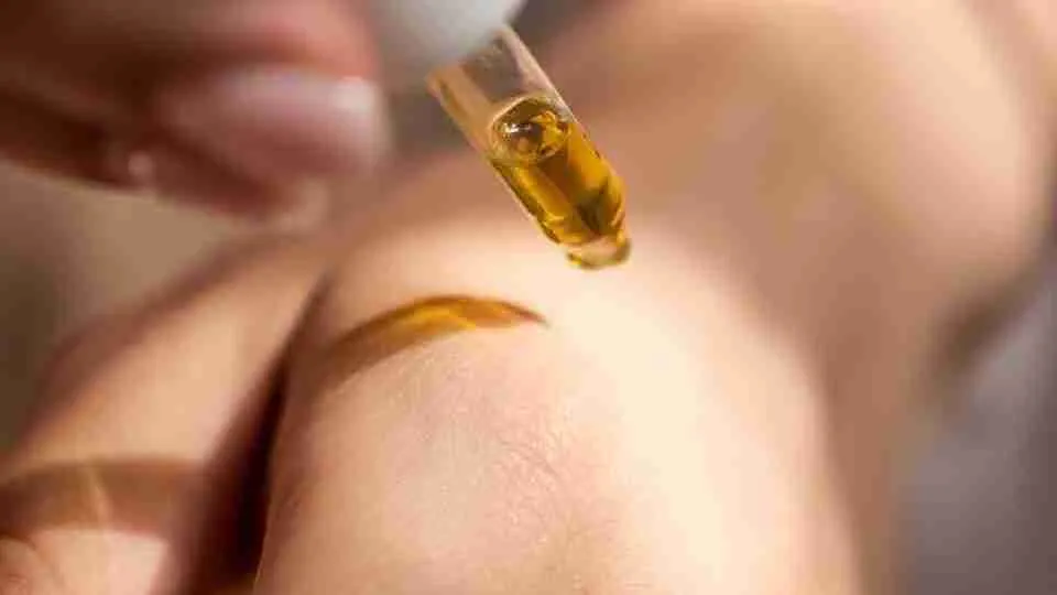 person holding dropper