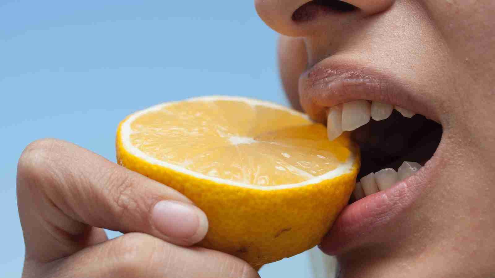 person holding lemon