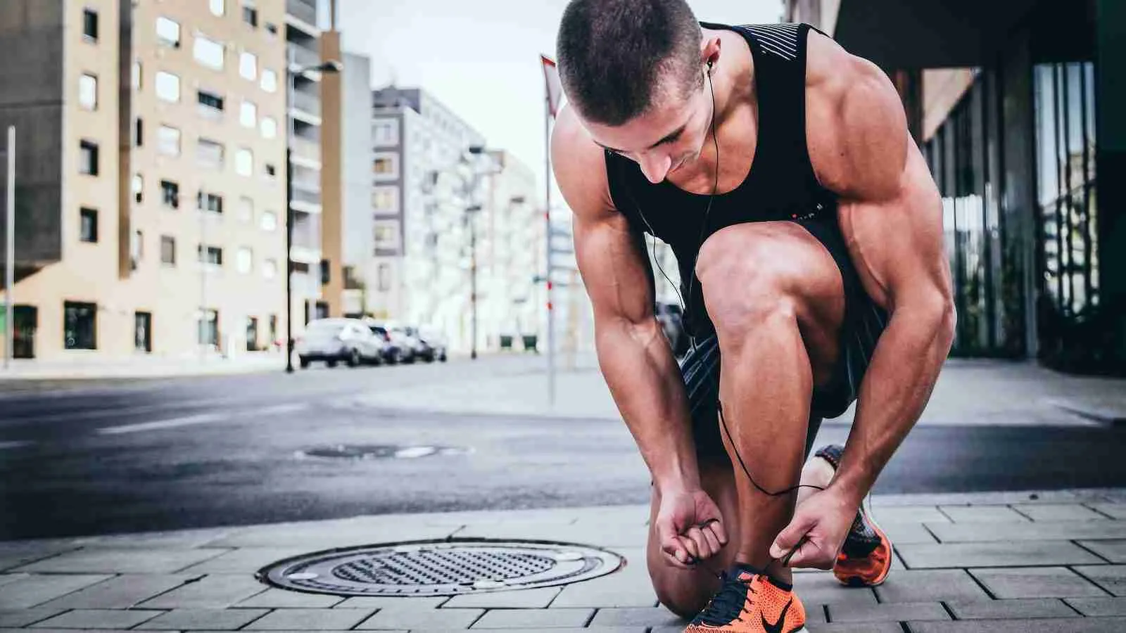 man tying his shoes