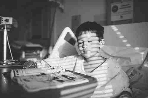child on a hospital bed