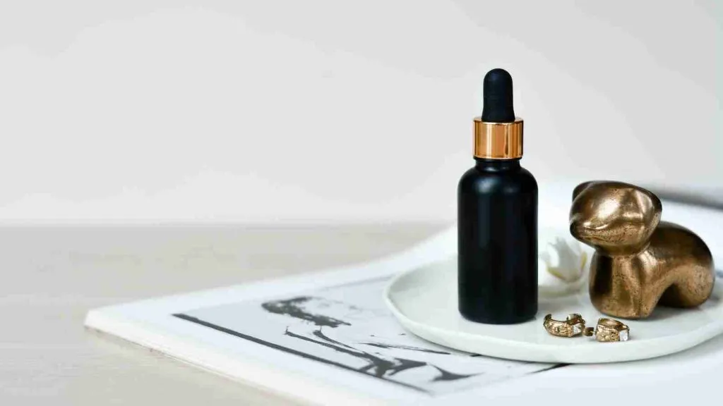 bottle of skin serum on a plate