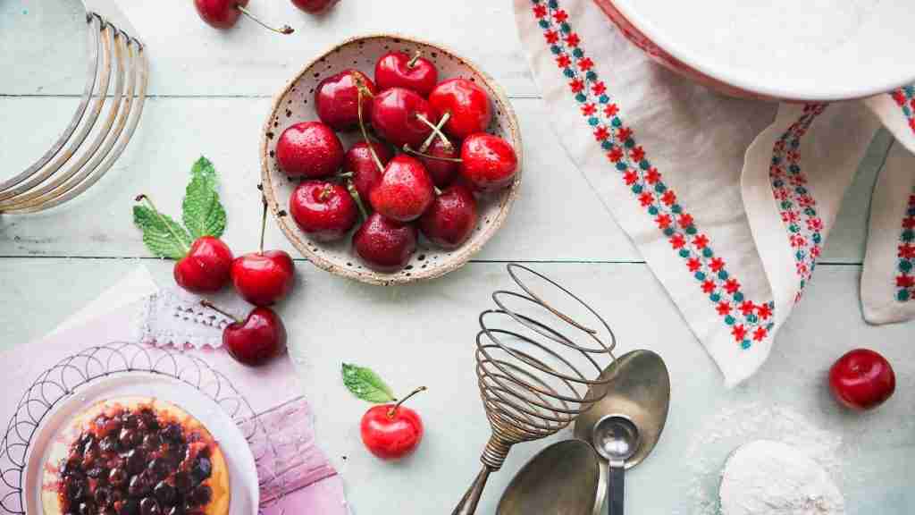 red berries in bowl on table