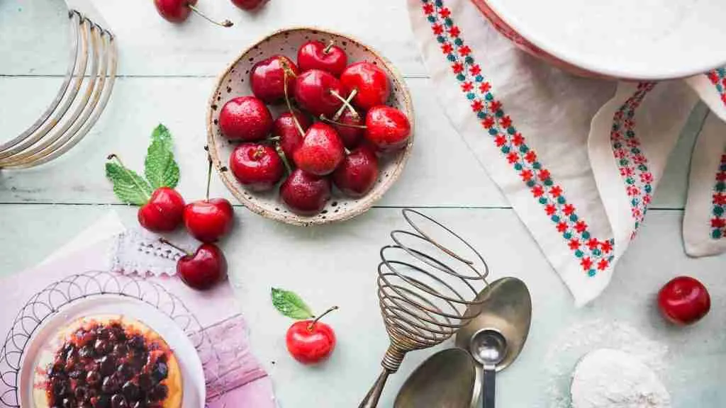 red berries in bowl on table