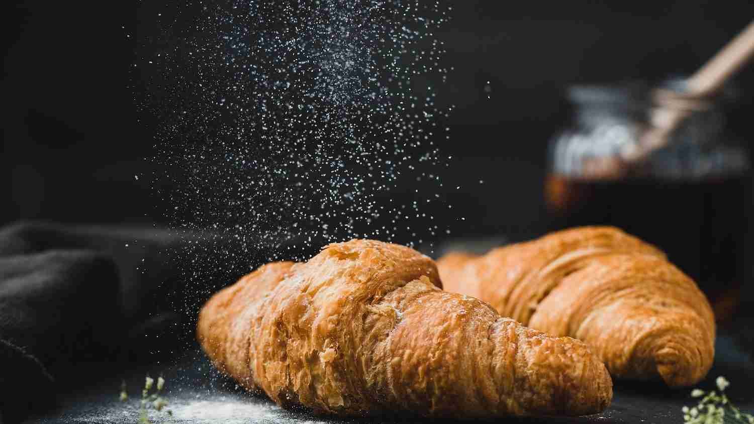 two brown croissants