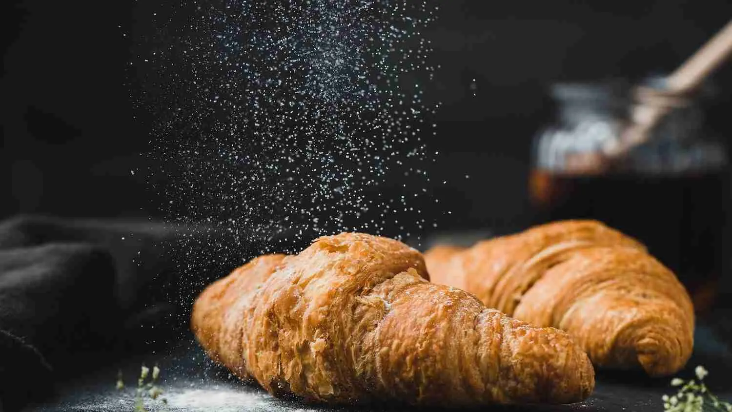 two brown croissants