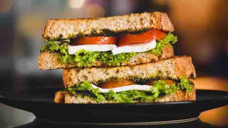black plate with sandwich