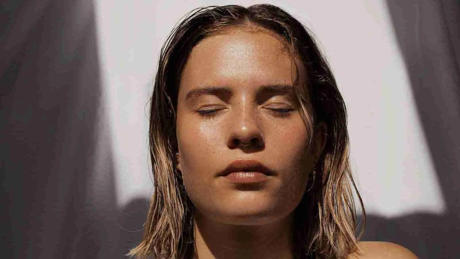 woman embracing sunshine