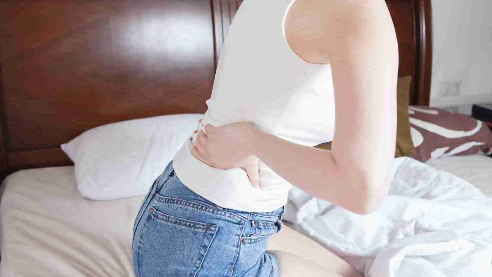 Women showing sign of stomach discomfort