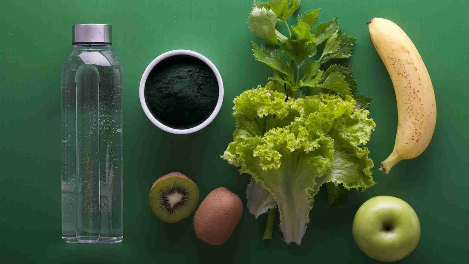 assorted fruits and vegetables on green surface