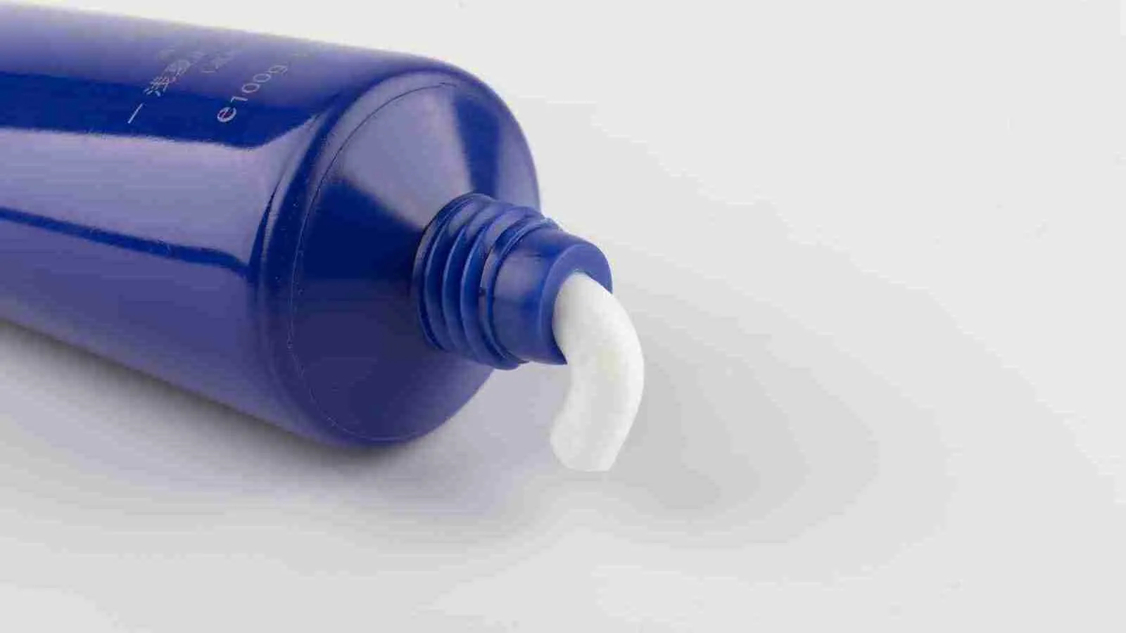 Purple toothpaste tube