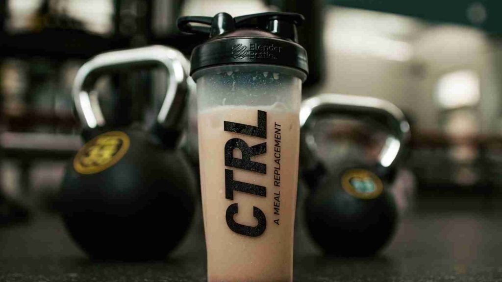 Protein shake with dumbells