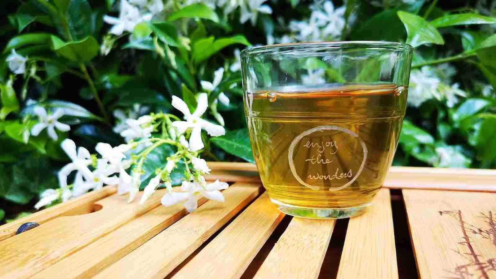 Green tea in a glass mug.