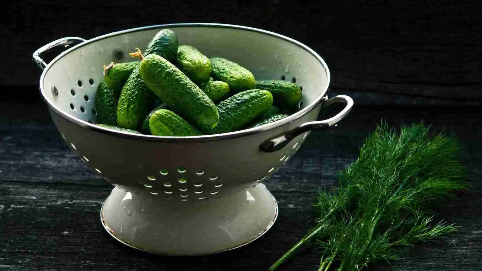 bowl strainer and Cucumbers placed inside it