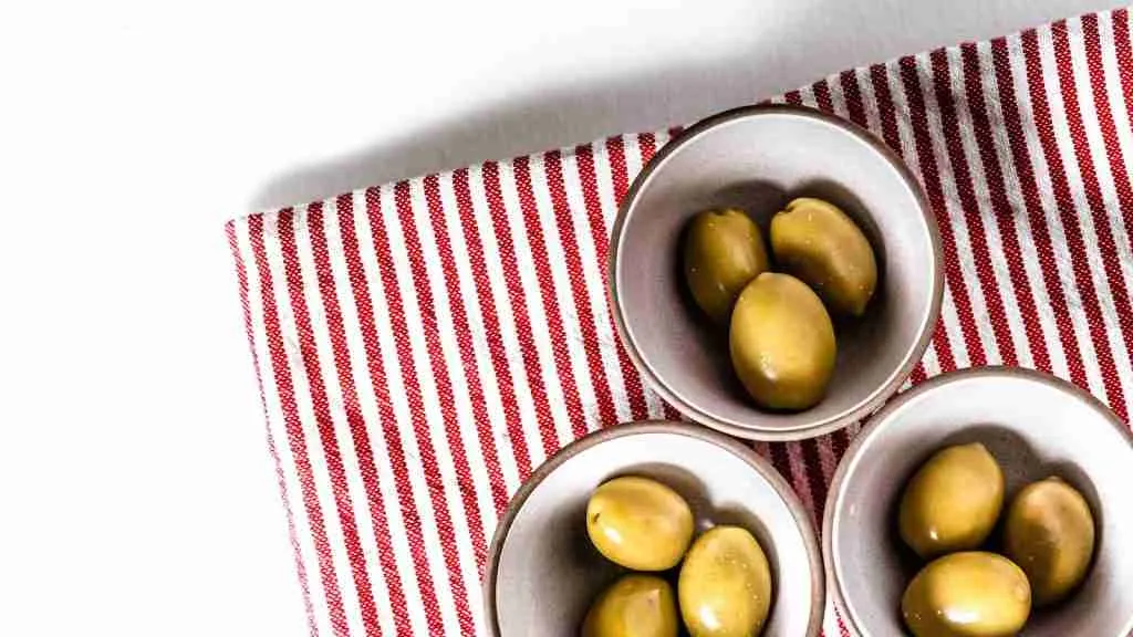 Olives placed in 3 bowls