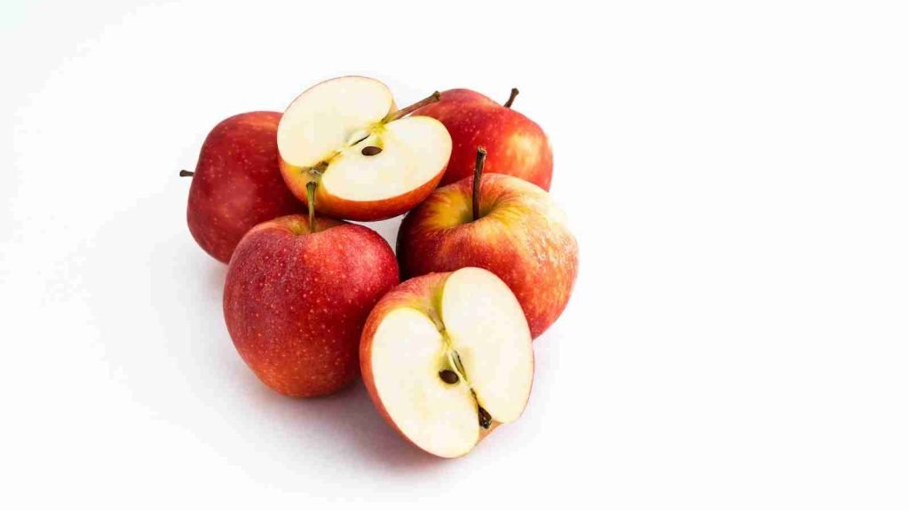 3 red apples on white background