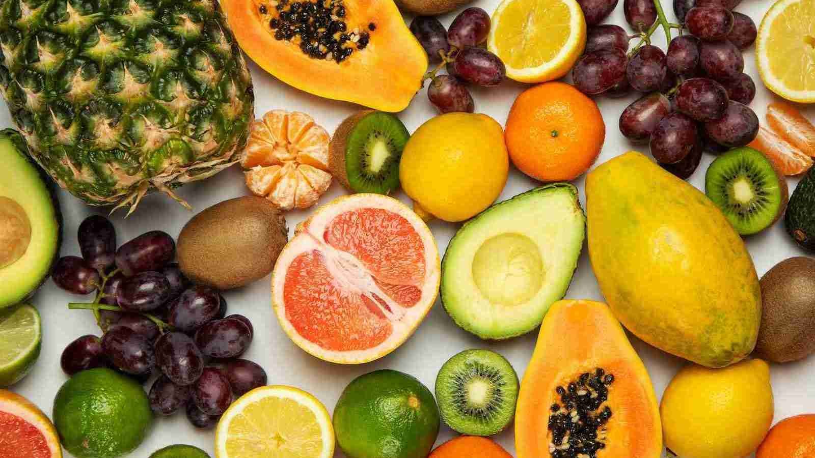 sliced orange fruit and many other fruits