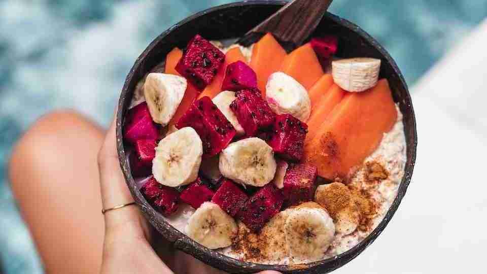 fruits with oatmeal in a bowl.