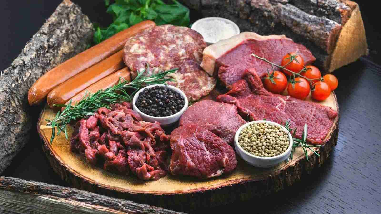 raw meat on white ceramic plate