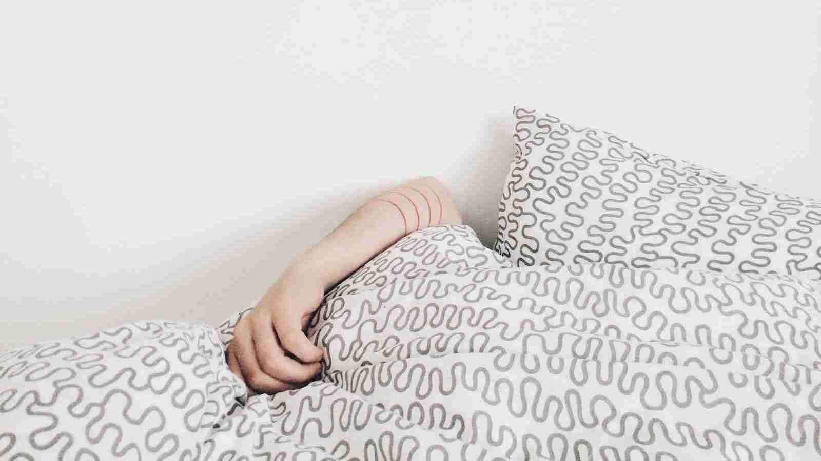 person lying on bed